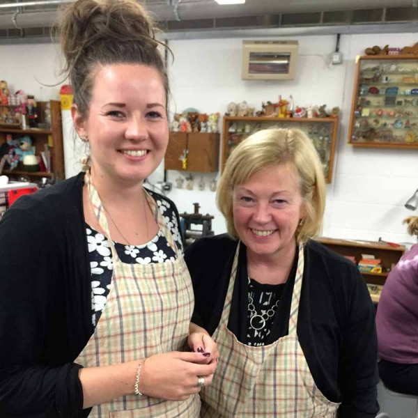 mum ad daughter smiling in the workshop 1