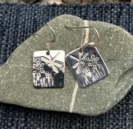 Sterling silver earrings with stamped and roll printed detail