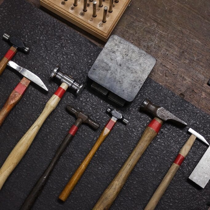 Hammers and punches on the workbench
