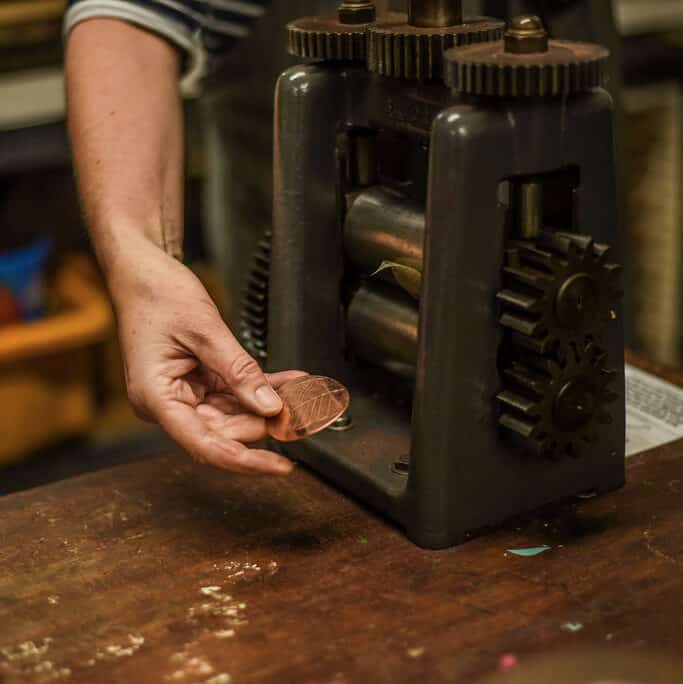 Roll printing a leaf onto copper