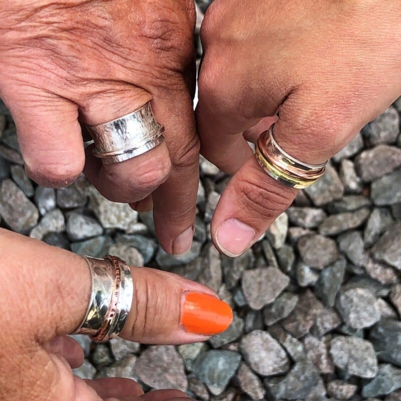 Students showing off their spinner rings