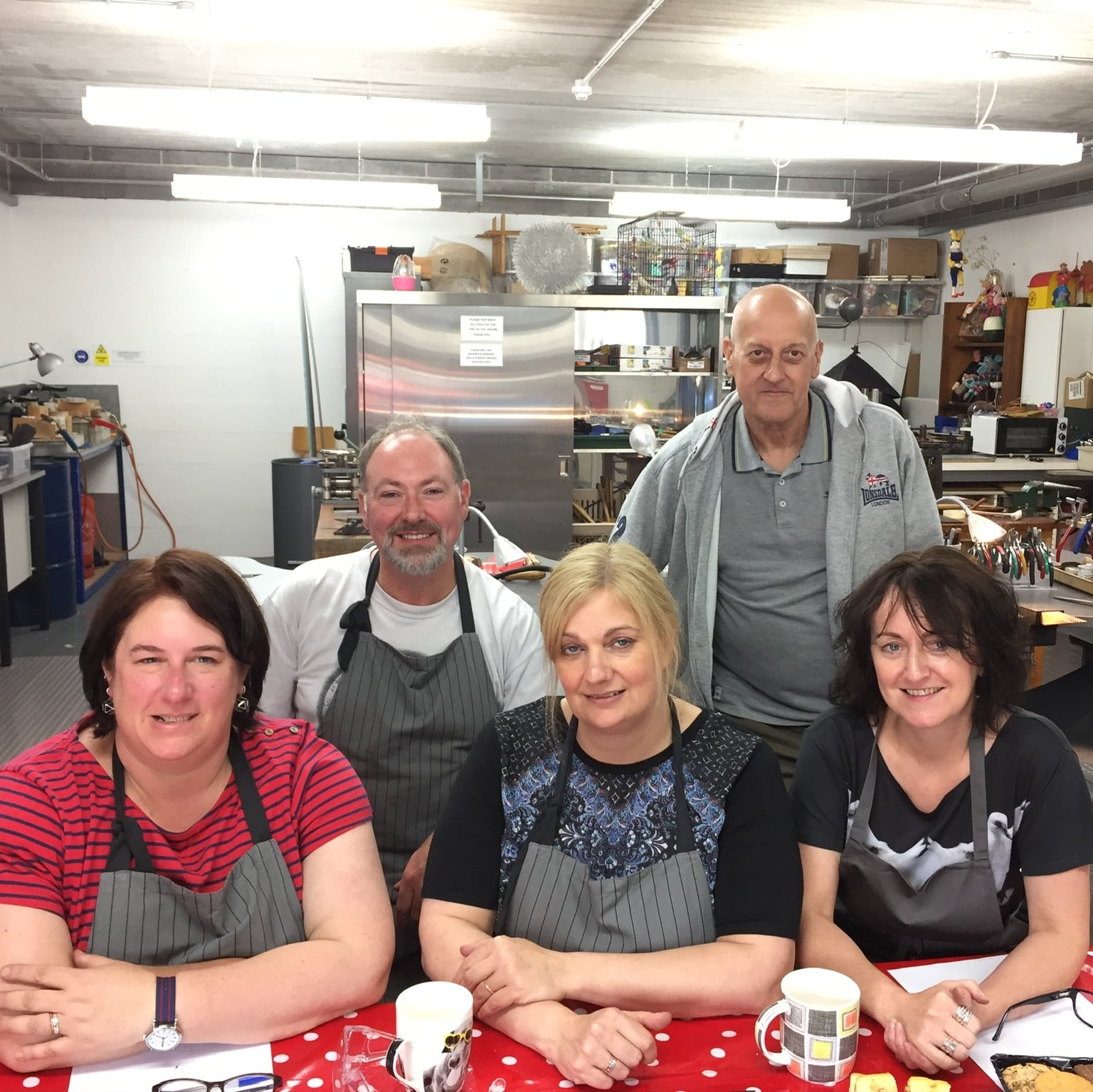 Group of five people in the workshop