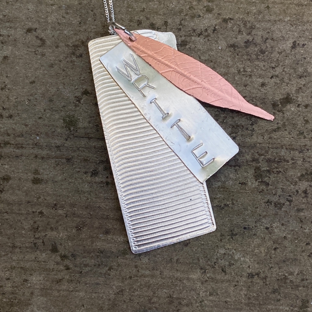 Mixed metal layered pendant