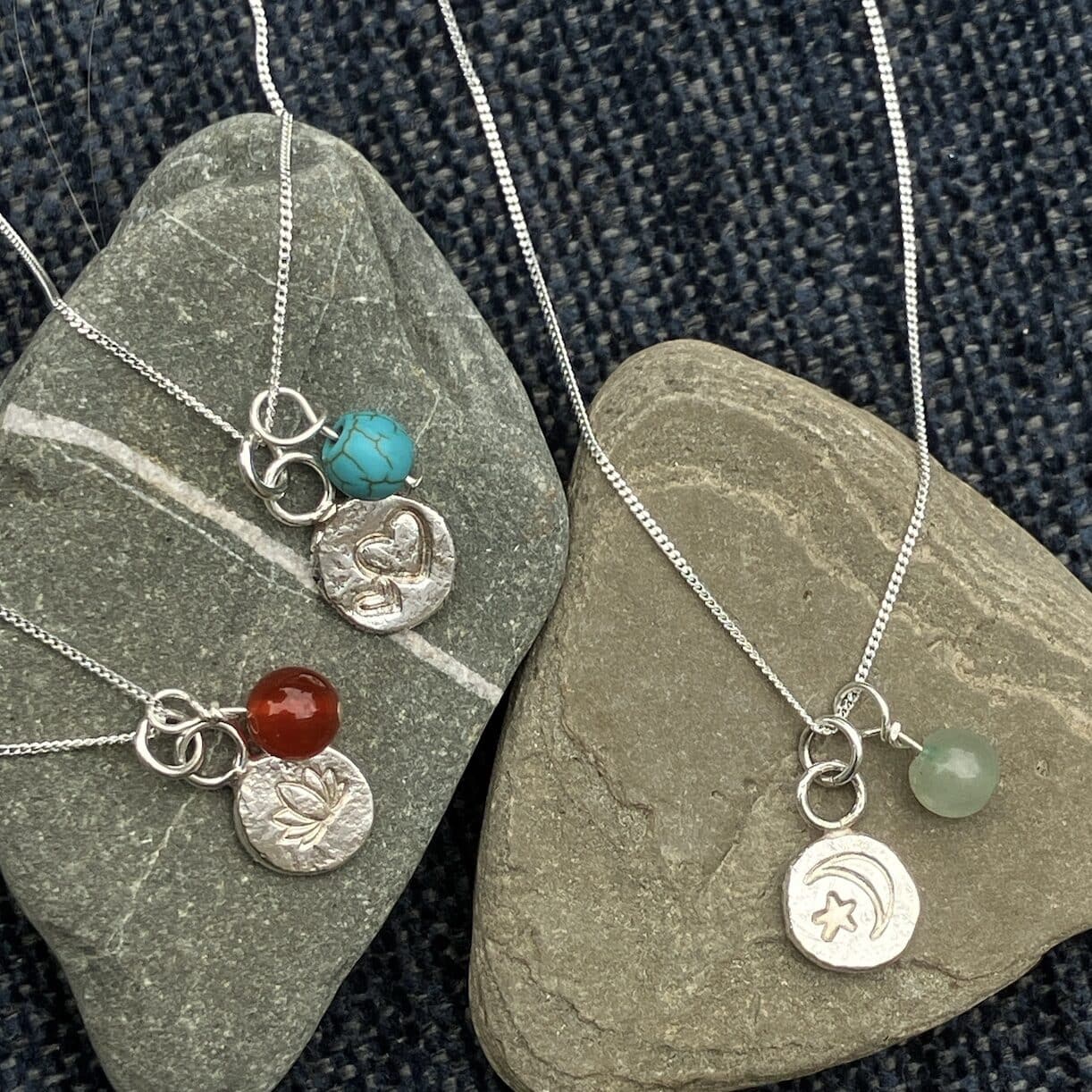 Recycled silver and gemstone bead pendants.