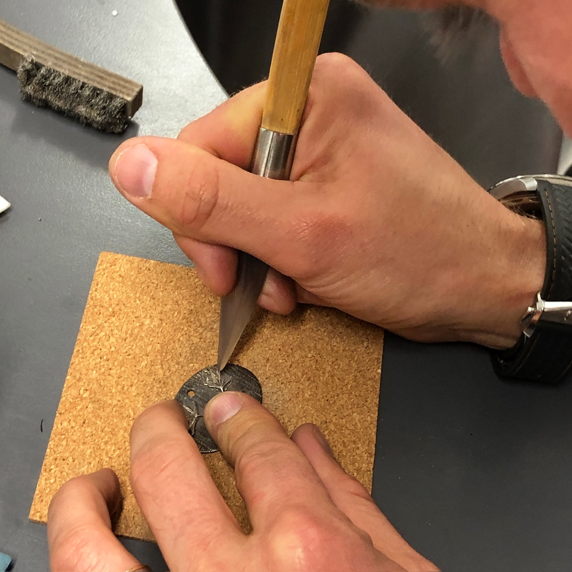 Silver clay work in progress burnishing