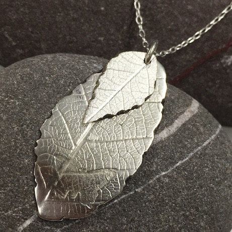 Silver pendant with leaf print