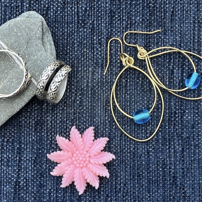 Rings made from up-cycled hoop earrings with colourful earrings and brooch