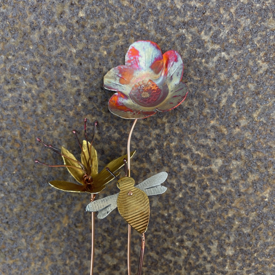 Mixed metal flowers and bee sculpture